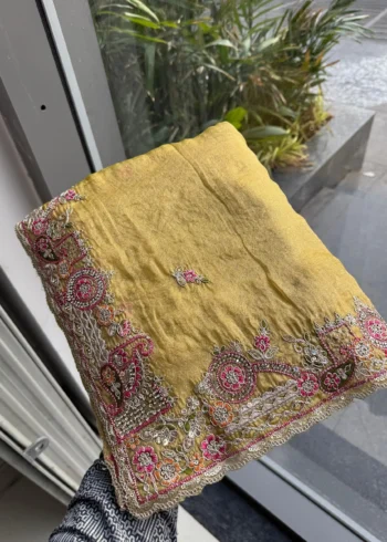 Yellow Fendy Satin Silk Wedding Saree with Embroidered Cutwork Border in hand