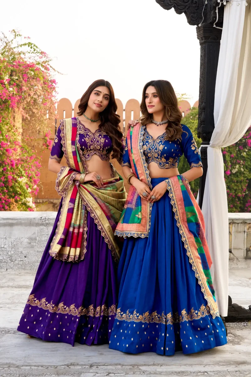 Two girls wearing Blue and Purple Vichitra Silk Sequin Embroidered Wedding Lehenga