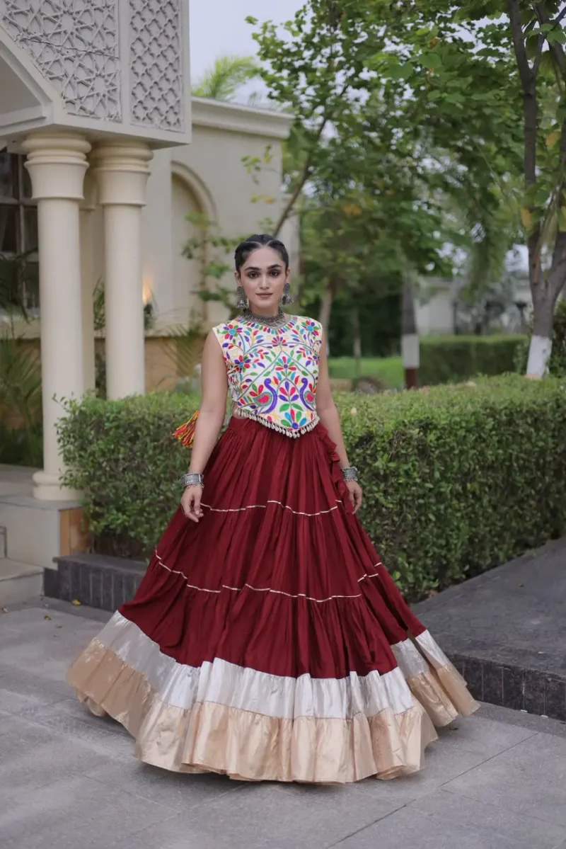Maroon Rayon Navratri Lehenga Choli with Kutchi Work flair look