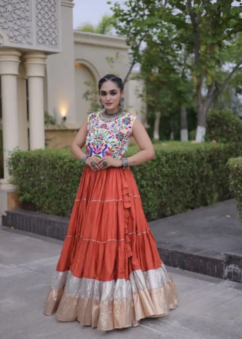 Rust Orange Rayon Navratri Lehenga Choli with Kutchi Work front look
