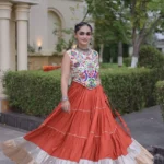 Rust Orange Rayon Navratri Lehenga Choli with Kutchi Work flair look