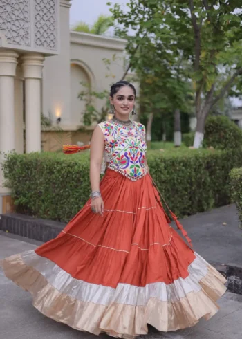 Rust Orange Rayon Navratri Lehenga Choli with Kutchi Work flair look