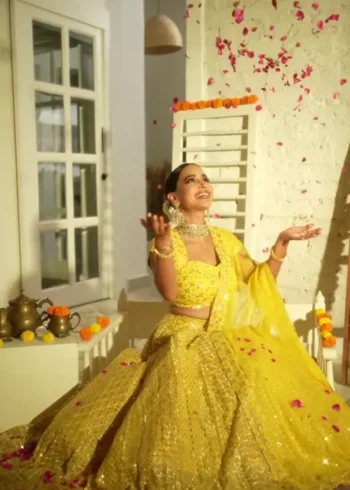 Yellow Zari Sequin Embroidered Haldi Lehenga Choli sitting look