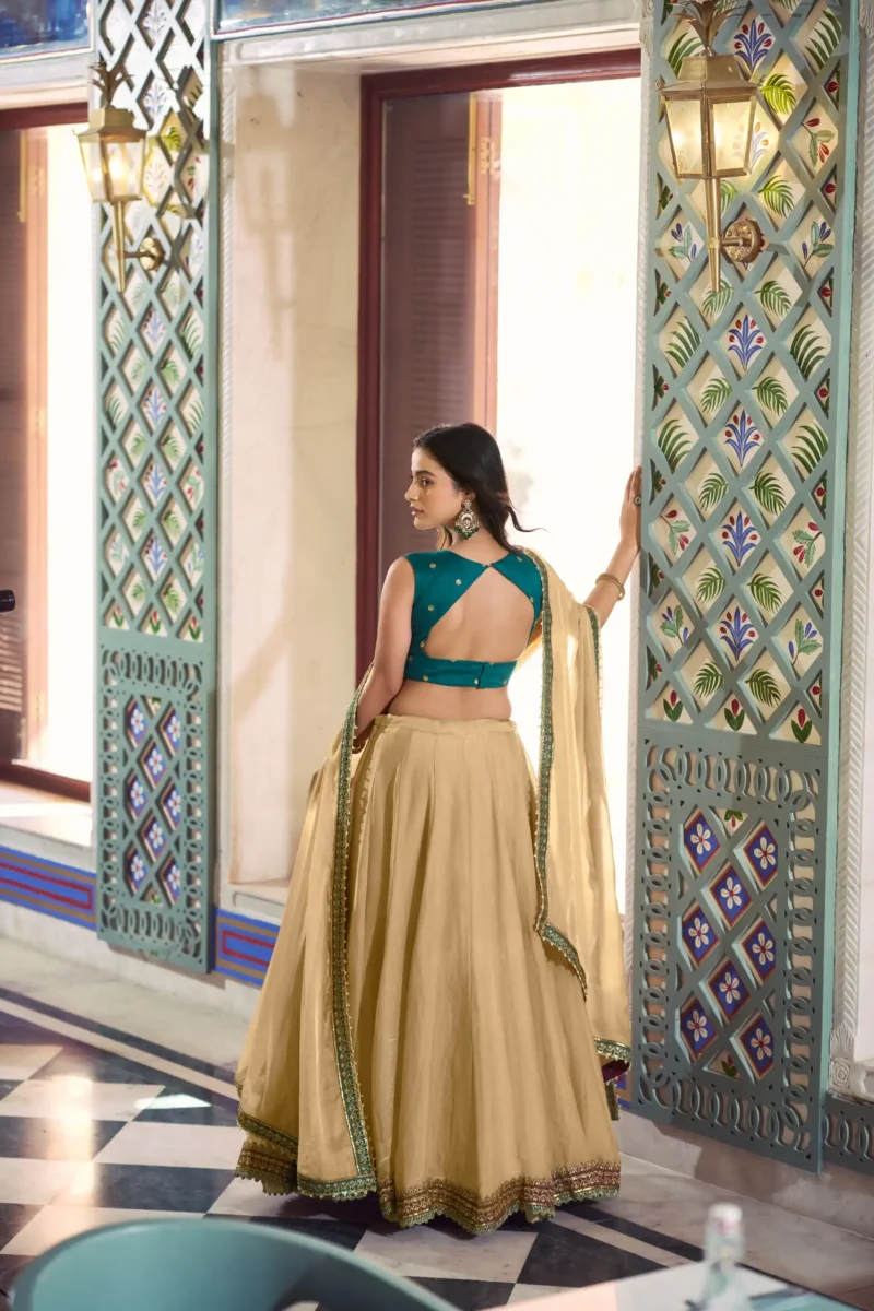 Chiku Frendysilk wedding bridesmaid lehenga with lace detailing and embroidered blouse back design