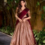 Pastel Peach colour South Indian lehenga in Dupion Silk with Zari weaving front look