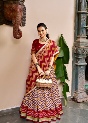 Maroon Colour Tasar Silk printed Hyderabadi lehenga with Ikat and Foil Print detailing front look