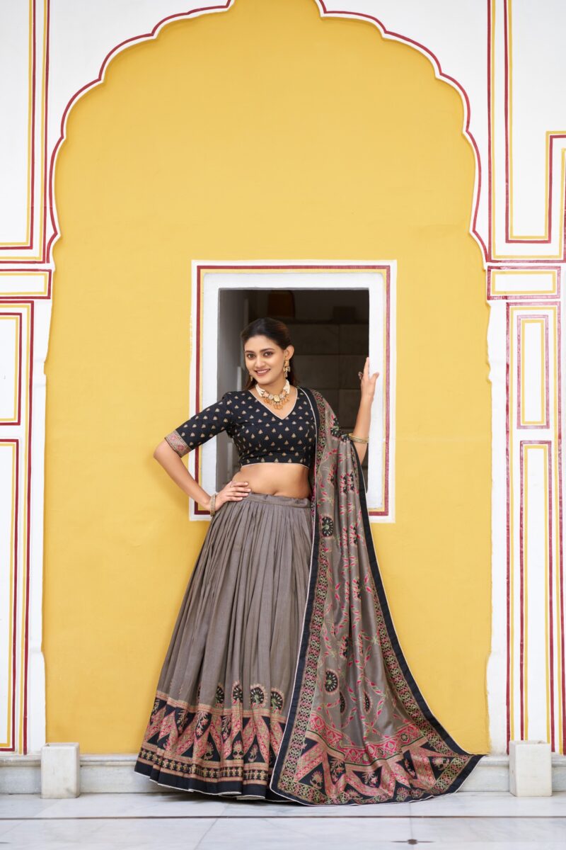 Black Colour Tasar Silk traditional temple wear lehenga with printed detailing and lace border
