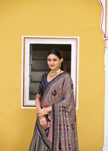 Black Colour Tasar Silk traditional temple wear lehenga with printed detailing and lace border close look