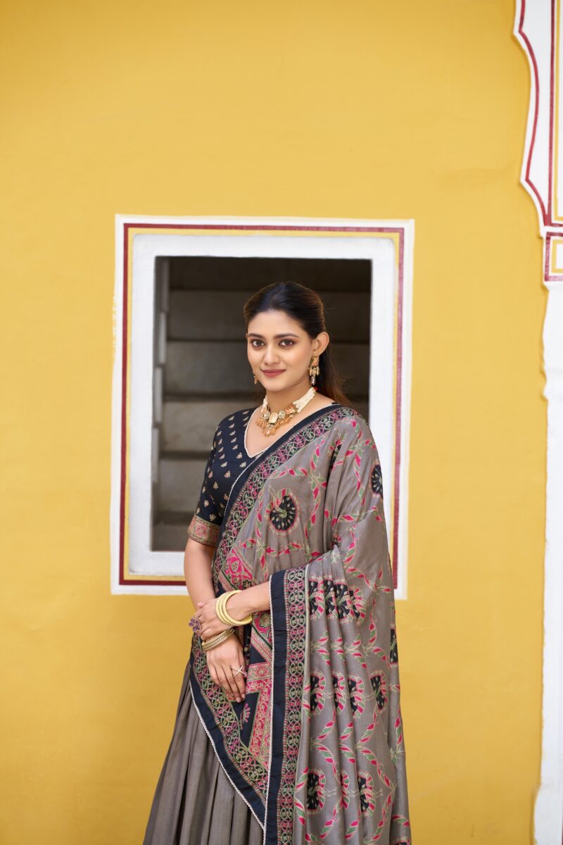 Black Colour Tasar Silk traditional temple wear lehenga with printed detailing and lace border close look