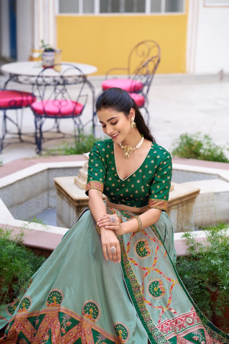 Green Colour Tasar Silk traditional temple wear lehenga with printed detailing and lace border close look