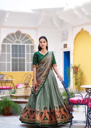 Green Colour Tasar Silk traditional temple wear lehenga with printed detailing and lace border front look