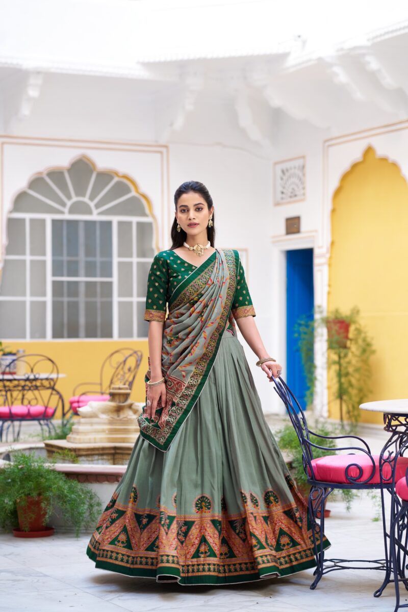 Green Colour Tasar Silk traditional temple wear lehenga with printed detailing and lace border front look
