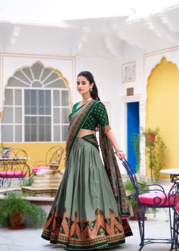 Green Colour Tasar Silk traditional temple wear lehenga with printed detailing and lace border
