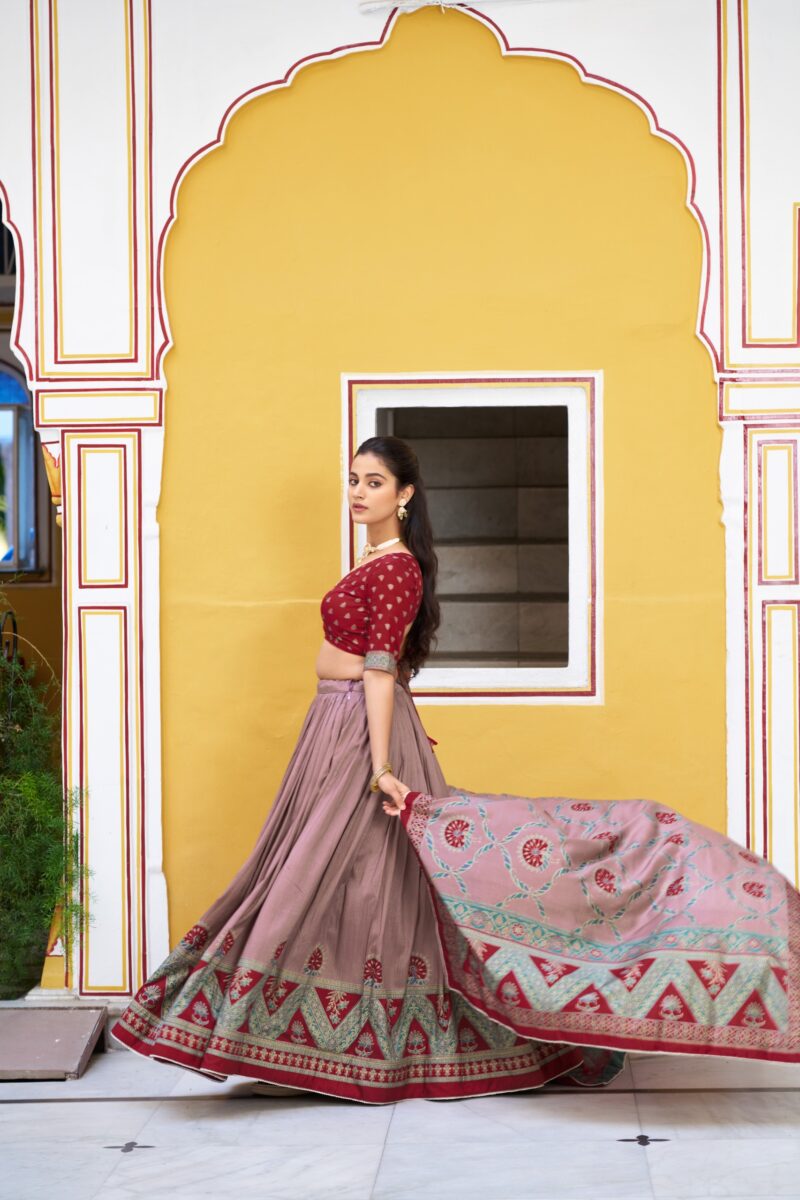 Maroon Colour Tasar Silk traditional temple wear lehenga with printed detailing and lace border side look