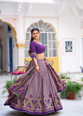Purple Colour Tasar Silk traditional temple wear lehenga with printed detailing and lace border flair look